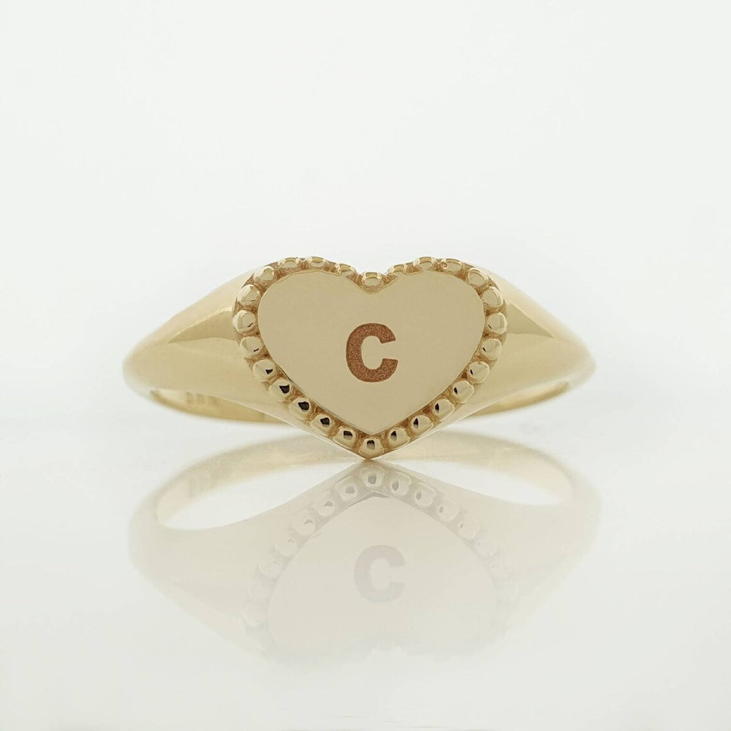 Custom gold heart ring