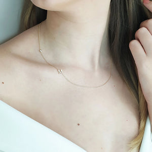 Sideways initial necklace