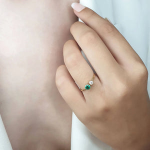 Two stone diamond emerald ring