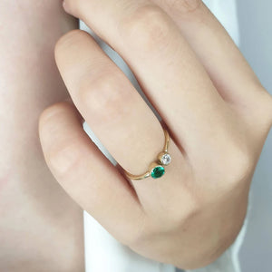 Two stone diamond emerald ring