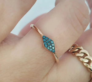 Triangle ring with blue diamonds