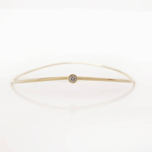 “Wave” Bangle with diamond in solid gold