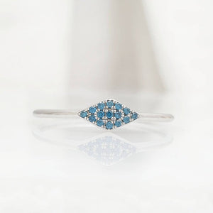 Triangle ring with blue diamonds